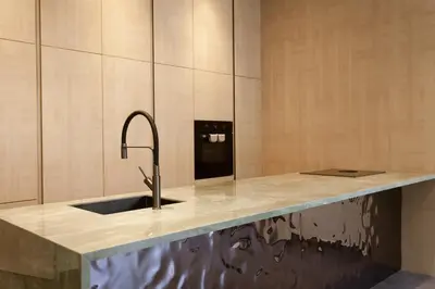 a kitchen with a sink and a counter at HUGme Suite in Kalithies