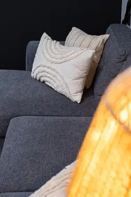 a close up of a couch with a pillow on it at House of Paralympic Athlete Mike Seitis in Rhodes Town