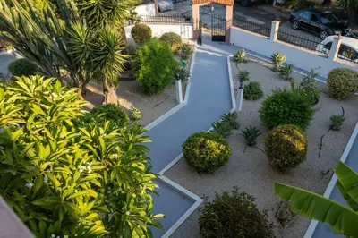 an overhead view of a garden with trees and bushes at Makiaris Villa in Archangelos