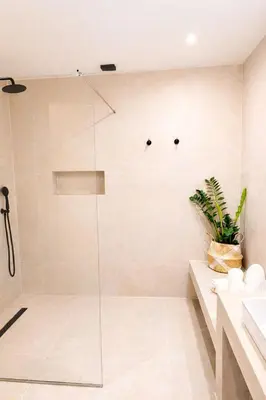 a shower with a glass door in a bathroom at Marev Nature & Luxury Suites -Private Jacuzzi in Ialyssos