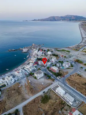 an aerial view of my senses survey studio on the beach at My Savvas Studios in Haraki