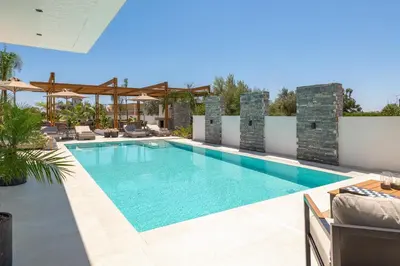 a swimming pool on the roof of a house at Lanik Luxury Pool Villa in Afantou