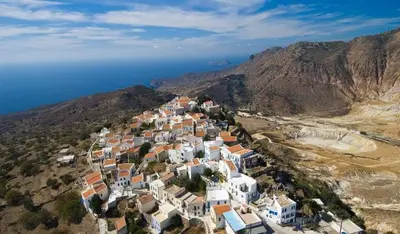 an aerial view of a town on a mountain at Melitsaka in Nikiá