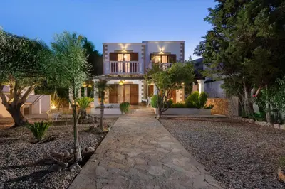 a home with a pathway leading to the front door at Le Soleil De Lindos - Luxury Villa with Swim Spa in Líndos