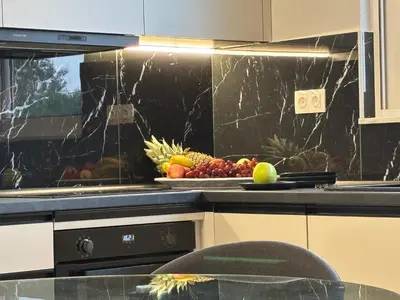 a kitchen with a plate of fruit on a counter at Kyra Maria 3, Loft in Rhodes Town