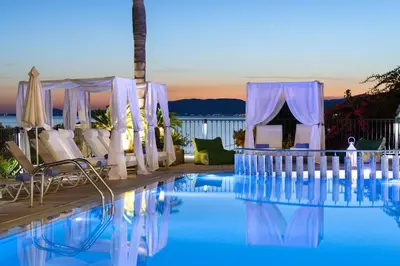 a wedding set up by the pool at a resort at Pefkos View Suites & Maisonette in Pefki Rhodes
