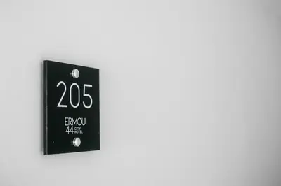a lightswitch with the number on it at Ermou 44 City Hotel in Faliraki