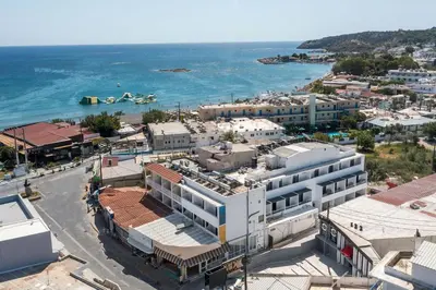 an aerial view of a city with the ocean at Aurora Living - Adults Only in Faliraki