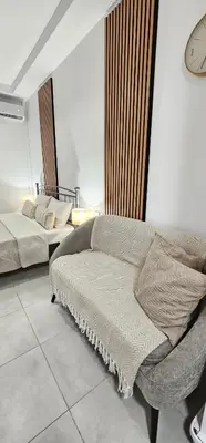 a bedroom with two beds in a room at Spiti Studio City Center in Rhodes Town