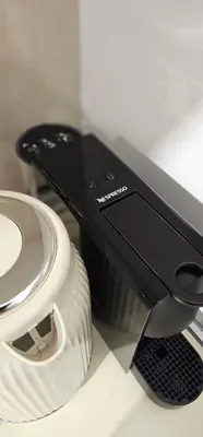 a close up of a remote control next to a cd at Spiti Studio City Center in Rhodes Town