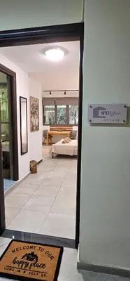 a door leading into a room with a living room at Spiti Studio City Center in Rhodes Town