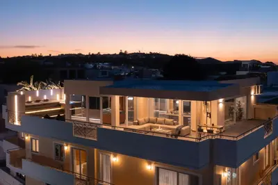 a view of a building at night with lights at Hamilton Elite Penthouse in Rhodes Town