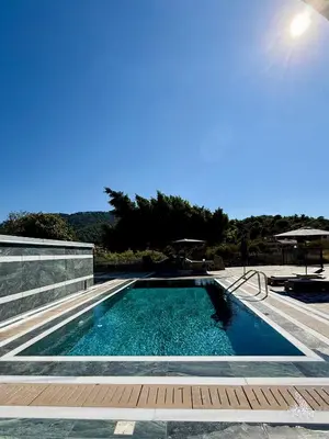 a swimming pool in the middle of a house at Casa Loma 2 in Rhodes Town