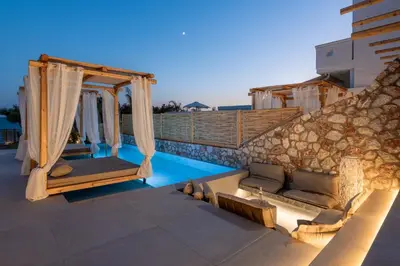 a villa with a swimming pool and a resort at KIVOTOS BLACK Horse in Pefki Rhodes