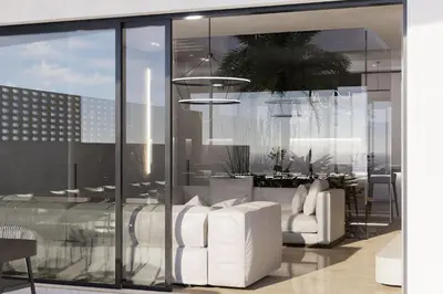 a living room with white furniture and glass walls at Monte Smith Aether & Aura Villas in Ixia