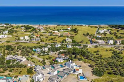 an aerial view of a residential estate near the ocean at Villa Ruby Gem by Villa Plus in Gennadi