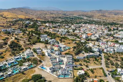 an aerial view of a town with mountains in the background at Villa Ruby Gem by Villa Plus in Gennadi