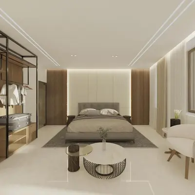 a bedroom with a bed and a coffee table at The Wine Suites in Rhodes Town