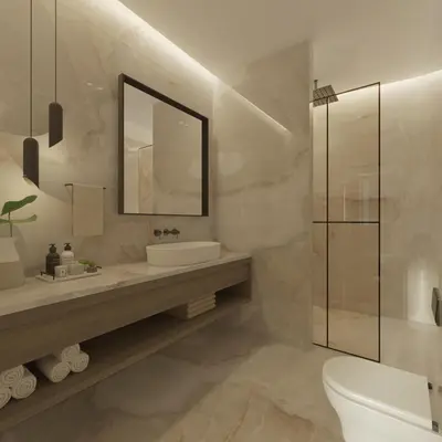 a bathroom with a sink and a mirror and a toilet at The Wine Suites in Rhodes Town