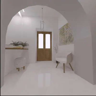 a white room with a wooden door and a chair at The Wine Suites in Rhodes Town