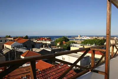 a view of a city from the roof of a building at Evdokia Old Town Hotel in Rhodes Town