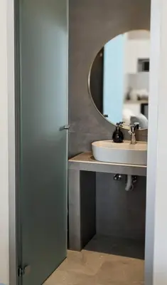 a bathroom with a sink and a mirror at Nirea Tree View Studio in Faliraki