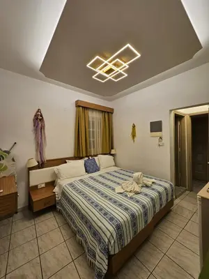 a bedroom with a bed in a room at St Paul's Studios Chrysanthi in Líndos