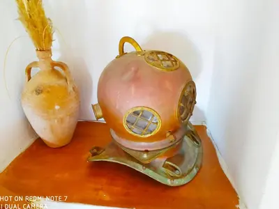 a statue of a kettle and an onion on a table at Villa Chrysodimi in Halki