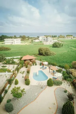 an aerial view of a resort with a swimming pool at Holiday Home Gennadi Dreams Ferienvilla by Interhome in Gennadi