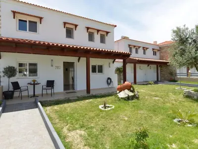 an image of a house with a yard at Holiday Home Haus in Kolympia mit Parkplatz und Bergblick by Interhome in Kolimbia
