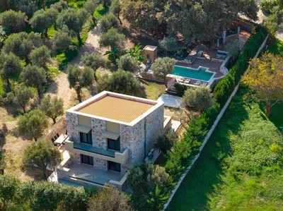 an aerial view of a house with a swimming pool at Estate Irianna 4 Bedroom Private Pool Villa & 2 Bedroom Guesthouse Rhodes in Ialyssos