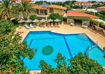 an overhead view of a swimming pool at a resort at Paras Sun Hotel & Apartments in Ialyssos