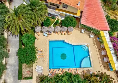 an aerial view of a resort with a swimming pool at Paras Sun Hotel & Apartments in Ialyssos