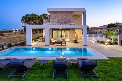 a villa with a swimming pool in the yard at Villa Terra Magna Alba by Villa Plus in Gennadi
