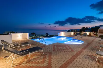 a swimming pool on the roof of a house at Pefkos Sea Serenity Villas in Líndos