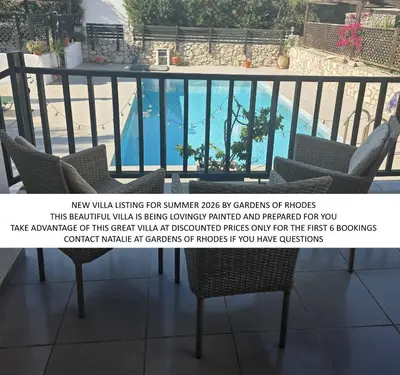 a sign on a balcony with a swimming pool at 2 Bedroom Villa with Pool Pylona Gardens close to Lindos in vlicha