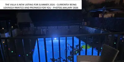 a picture of a swimming pool at night at 2 Bedroom Villa with Pool Pylona Gardens close to Lindos in vlicha