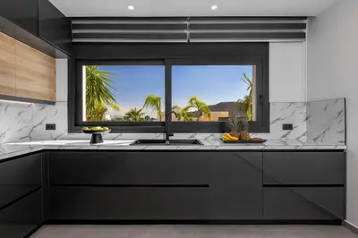 a kitchen with a sink and a window at Luxury Villa Amani Retreat in Líndos