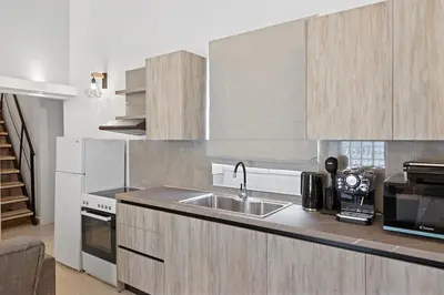 a kitchen with a sink and a counter top at VastekaHouse3 in Haraki