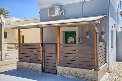 a building with a gate in front of it at VastekaHouse3 in Haraki
