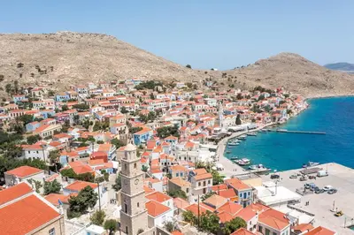 an aerial view of a town next to the ocean at Isminis Villa in Halki