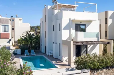a view of a villa with a swimming pool at Villa Laila in Ialyssos