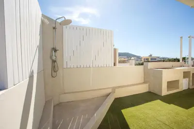 a bathroom with a shower and a sink at Villa Laila in Ialyssos