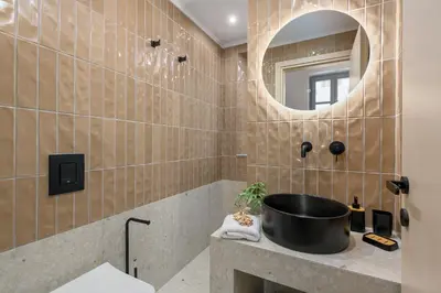 a bathroom with a sink and a mirror at Villa fiore in Rhodes Town