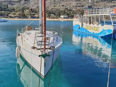 two boats are docked next to each other in the water at Holiday Home Haus in Afantou - Privater Parkplatz und Pool by Interhome in Afantou