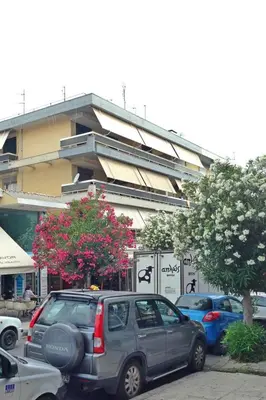 a car parked in a parking lot in front of a building at Apartment Einzigartige Wohnung auf Rhodos by Interhome in Rhodes Town