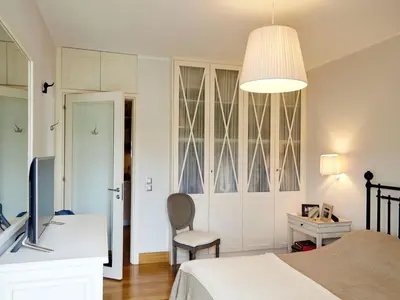 a bedroom with a bed and a desk and a television at Apartment Einzigartige Wohnung auf Rhodos by Interhome in Rhodes Town