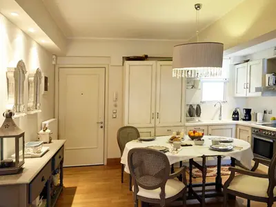 a kitchen and dining room with a table and chairs at Apartment Einzigartige Wohnung auf Rhodos by Interhome in Rhodes Town