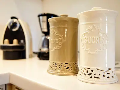 two containers sitting on top of a kitchen counter at Apartment Einzigartige Wohnung auf Rhodos by Interhome in Rhodes Town