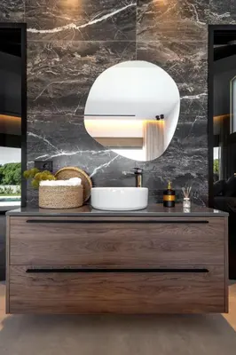 a bathroom with a sink and a mirror at Holiday Home Emerald Estate by Interhome in Asgourou